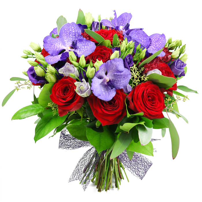 Opulent and romantic, this bouquet unfolds like a painting in deep red and regal purple. Against the clean white backdrop, several large red roses anchor the arrangement with velvety petals tightening into elegant spirals, evoking passion and timeless love. Purple Vanda orchids rise in stately terms, their broad petals speckled with a jewelled pattern that gives an exotic air. Soft lisianthus threads weave through the roses and orchids, with buds and open blooms in lavender tones that glow softly. The greenery swells around the blooms: broad, glossy leaves create a dark-green frame, while slender sprigs-perhaps eucalyptus-add a whisper of scent and movement. Fresh green buds and tiny filler blossoms sprinkle the bouquet, like dew on a garden at dawn. The stems are tied at the base with a dark, almost black or deep plum netted ribbon, giving the piece a contemporary lift and a delicate, airy bow. This design radiates romance and sophisticated celebration, ideal for anniversaries, Valentine-style gifts, or as a gift to mark a significant moment. Crafted by a seasoned Epping florist, the arrangement speaks of attention to detail, long-lasting freshness, and a knowledge of how to convey heartfelt sentiment in a single, radiant gesture. It's a cherry-picked composition that would brighten a living room, a hotel lobby, or a ceremonial table in Epping or surrounding towns, delivering elegance with every stem.