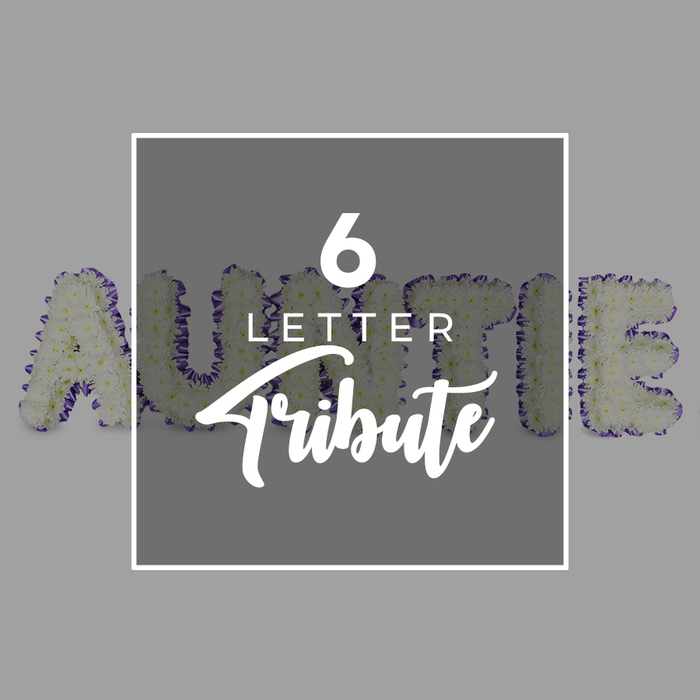This six-letter floral tribute to Auntie is a quiet, powerful homage. Each letter is formed from a generous spread of small white chrysanthemums, their petals packed tightly to create a serene, almost cloud-like block of bloom. The edges are beautifully defined by a trim of purple flowers or ribbon, a subtle flourish that adds character to the pristine white surface. The backdrop is a soft, neutral gray, letting the letters breathe and glow with understated dignity. Centered within the arrangement is a square white frame, faintly overlaying the blooms. Inside the frame, the font reads 6 LETTER in a clean sans-serif, followed by Tribute in an elegant script. The composition signals a personalized memorial-a six-letter message of love and remembrance. In Epping's close-knit community, such tributes carry a gentle authority; they travel from doorstep to church hall with care, bringing solace to families at times of loss. It's a piece that blends craft and compassion-white chrysanthemums unfurling in perfect order, while the purple border threads the memory with warmth. It would suit a quiet church service near The Green or a family reception on a side street off High Street, offering a tangible sign of respect and connection in our local area.