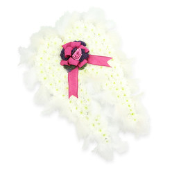 This image shows an elegant funeral flower tribute shaped into a pair of angel wings, laid out against a pure white background so every detail can be clearly seen. The wings are composed from hundreds of small white blossoms, likely spray chrysanthemums, placed closely together until they resemble freshly fallen snow or a soft blanket of cloud. Each tiny flower head, with its faintly green centre, adds quiet texture and depth, as though the wings have been painted with light. Along the entire outline of the wings, a delicate fringe of white feathers is carefully arranged, echoing the softness of real plumage and enhancing the spiritual, guardian-angel symbolism that many families in Epping and the surrounding villages look for in a final tribute. At the point where the two wings meet, a vivid fuchsia satin ribbon is tied into a luxuriant bow, its sheen catching the light much like shopfront displays along Epping High Street on a bright day. Resting within the knot of the bow is a single, graceful pink rosebud, cradled by a collar of deep violet thistle-like florets or foliage that provide striking contrast and a subtle suggestion of strength in sorrow. The design feels both contemporary and timeless, suitable for resting on an easel beside the coffin, at a crematorium chapel, or in a place of remembrance. Created in the quiet, careful manner of a dedicated funeral florist, this angel-wing arrangement is intended to convey comfort, farewell, and enduring affection for a loved one's passing.