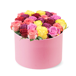 Imagine stepping into a sunlit studio on the edge of Epping and meeting this plush round pink hat box that becomes a stage for a garden of roses. Dozens of blooms glitter with life, their colors flowing like a couture scarf-sunny yellow, vibrant red, plum burgundy, lilac, soft peach creams, and pinks ranging from blush to hot fuchsia, all nestled tightly with subtle cream accents. The arrangement reads couture yet remains inviting, a versatile gift for birthdays, romance, or simply brightening someone's day. The hat box's touchable velvet finish adds a modern twist, while a whisper of rose fragrance, mingled with citrus and green notes, fills the air in memory. Flowers Epping crafts this piece with calm confidence, a local hallmark near Epping town centre that speaks to the community from Chigwell to Loughton. Available for same-day delivery across EN and surrounding areas, including Buckhurst Hill, so loved ones in the region can feel seen with a thoughtful, premium gift. The bold yet balanced color story communicates love, joy, and beauty, while the presentation signals quality and meticulous design. This image is more than a pretty bouquet; it's a promise of seasonal freshness, expert technique, and a touch of luxury you can expect from a trusted local florist serving the Epping district.