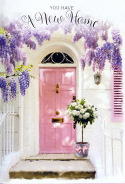 A peaceful front step in Epping becomes a story of quiet joy, centred around a softly painted pink door that seems to hold the warmth of the afternoon in its pastel panels. Overhead, the house is draped in cascades of lavender wisteria, the blossoms falling in layered garlands that brush the top of the frame and trail delicately towards the doorway, casting faint lilac shadows on the whitewashed wall. A matching blush shutter sits to one side, its weathered paint catching specks of sunlight, just as you might see along the residential streets off Bell Common. At the base of the door, a stylish tin-grey bucket rests on the step, brimming with luxurious white and cream roses arranged with a florist's practiced hand. Each bloom looks freshly cut and carefully turned outward, cushioned by sprigs of pale green foliage that soften the outline of the arrangement. A slender pink ribbon, tied into a gentle bow, encircles the bucket like a final, romantic flourish, uniting the pastel palette from petal to paintwork. The light in the scene is golden and forgiving, the kind that makes colours melt into one another and emphasises the velvety textures of the roses and the papery softness of the wisteria petals. The overall impression is one of tender optimism, perfect for someone unlocking the door to a new home in Epping, Theydon Bois, or nearby villages. It feels like a floral embrace waiting on the doorstep, ideal for a housewarming gift that says, without words, that this place is already filled with care, comfort, and the promise of happy memories.