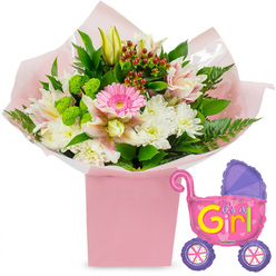 Displayed against a clean white backdrop, this new baby girl arrangement feels like a tender welcome captured in flowers and foil. A square, light pink gift box holds a full, luxuriant bouquet, wrapped in blush-pink tissue and a layer of clear cellophane that adds a soft, crinkled texture. From the box rises a carefully balanced mix of blooms: at the centre, a bright pink gerbera daisy draws the eye with its cheerful, open face, while around it cluster velvety white chrysanthemums and pale alstroemeria, their petals gently brushed with pink and fine speckling. A creamy yellow lily bud leans gracefully from the top, promising future blossoms in the days after the baby girl comes home, much like the unfolding of new routines in a family house near Stonards Hill or Bell Common in Epping. Vivid green button-like flowers nestle among the petals, their rounded texture and fresh colour brightening the arrangement, while deep red hypericum berries add warmth and contrast. Glossy dark green leaves and feathery fern fronds weave through the bouquet, creating movement and a sense of natural abundance. To the right, a metallic foil balloon shaped like a traditional baby pram hovers playfully, shimmering in bright pink with a purple hood and purple wheels picked out with colourful spoke details. Across its side, bold yellow and green lettering declares "It's a Girl!", with small pink hearts echoing the bouquet's romantic tones. The whole ensemble feels like a heartfelt congratulations piece, the kind of gift that would sit proudly in a nursery or living room, bringing colour, fragrance, and a gentle sense of celebration to homes across Epping.