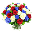 The photograph showcases an opulent, hand-tied bouquet of roses in a vivid trio of crimson red, creamy white, and royal blue, crafted into a near-perfect sphere that seems to hover against a bright white backdrop. The roses are closely massed, creating a smooth, rounded profile similar to the classic formal designs often delivered for ceremonies and family gatherings around Epping. Each blossom displays a different stage of bloom: some are tight, promising buds; others have opened enough to reveal the intricate spiral of their centres, with velvety petals that curl softly at the edges. The red roses appear rich and warm, the white roses glow with a subtle ivory sheen, and the blue roses provide a dramatic, almost electric contrast, giving the bouquet an unmistakably patriotic character. Between the blooms, flashes of deep green foliage appear, their glossy surfaces catching the light and adding depth, like brief glimpses of hedgerow leaves along the paths of Epping Forest. At the bottom of the arrangement, the cut stems are neatly aligned and bound, a visible reminder of skilled hands and fresh, same-day preparation. The overall lighting is even and clean, with no background distractions, so the viewer's attention is drawn entirely to the interplay of colour and texture. This bouquet feels both bold and refined, a fitting floral choice for local memorial services, national celebrations watched from living rooms near Lindsey Street, or as a strong, uplifting gift for someone who values classic roses presented in a modern, patriotic style.