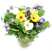 Sunlit and celebratory, this mixed bouquet is a testament to seasonal freshness, expertly arranged in a clear glass vase by a local Epping designer. The heart of the arrangement glows with large yellow Gerbera daisies, their bright centers like tiny sunbursts, framed by crisp white Calla lilies and airy Alstroemeria. Lavender to purple Lisianthus weave through, some blooms fully open, others softly closed, delivering a sense of movement and elegance. The bouquet sits on a lush bed of greenery, where silvery eucalyptus adds a cool scent and a whisper of breeze, while deeper green leaves provide a sturdy, verdant foundation. Light pours through the glass, revealing the neat, evenly spaced stems and the clean water that keeps every petal crisp and fresh. The black collar around the stems anchors the arrangement with a touch of modern polish. This piece feels ideal for a range of occasions in Epping-from birthdays and anniversaries to a simple expression of thanks-conveying warmth, happiness, and a sense of quiet celebration. Delivered with care across Epping, it brings a little sunshine to homes along the town's streets, from the High Street to the green, and makes for a memorable centerpiece for a dining table or a festive display in an office foyer.
