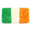 Under soft morning light, this rectangular tribute to Ireland's tricolour glows with quiet dignity. It begins on the left with a plush field of emerald green blooms-tiny carnations or chrysanthemums-each petal cluster inviting a gentle brush and lending the surface a slightly uneven, organic rhythm. The central band is white and luminous, a cloudlike row of tightly packed petals that conveys calm and clarity as your gaze travels across the flag. To the right, the orange panel shines with the same sculpted density, its vivid blooms radiating warmth and energy. Set against a pristine white backdrop, the three stripes align in perfect, equal proportion, a faithful echo of a national standard translated into living florals. The craft is evident in every petal-depth, texture, and the subtle play of light across the surface-yet the mood remains celebratory and respectful. This is a piece that could frame St Patrick's Day festivities, a community remembrance, or a doorway greeting in Epping, where such colour feels both local and meaningful. Delivered by Flowers Epping to households and venues around the town, it carries fragrance that is mild and fresh, a tactile reminder of shared heritage and hope, crafted with care by a local florist who understands the value of connection through flowers.