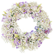 A round sympathy wreath composed entirely of fresh white and purple blooms is presented against a spotless white background, highlighting its balanced shape and intricate textures. The circular frame is lushly covered with sprays of white Baby's Breath, so fine and plentiful that they create a halo effect, like a ring of soft, drifting cloud. Among this airy foundation, clusters of Lisianthus blossoms are thoughtfully tucked in, their ruffled petals offering gentle movement and focal interest. Each Lisianthus bloom is predominantly white, but the edges and inner curves of the petals are traced with pastel lavender, lilac, and richer violet tones, giving a cool, refined contrast without overwhelming the simplicity of the design. Some blossoms are open and expressive, others remain in bud with hints of pale green and creamy tones, adding a sense of ongoing life amidst the stillness. The wreath has a clear, open centre, reinforcing its symbolic role as a circle of continuity and eternal love, often chosen to honour someone at a funeral or memorial. There are no decorative extras-no foliage, no ribbon-only the quiet interplay of small Gypsophila florets and larger Lisianthus blooms. The whole image feels calm and contemplative, reminiscent of a peaceful morning in Epping, perhaps not far from the tranquil edges of Epping Forest or the gentle bustle of the High Street. It is the kind of arrangement a local florist would carefully deliver to a service or resting place, offering a soft-spoken message of sympathy, comfort, and remembrance.