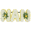 A carefully shaped, three-dimensional sympathy tribute reads NAN in bold capital letters, each constructed from a dense carpet of small, pristine white chrysanthemum spray flowers that give the surface a soft, cloud-like texture. Each letter is crisply defined by a lively border of smaller bright yellow blooms-likely button chrysanthemums or miniature carnations-whose cheerful hue trims the white base and brings a gentle, uplifting energy to the composition. The two outer N letters are brightened with compact clusters of deep, glossy green foliage-think camellia-like leaves or ruscus-interspersed with tighter yellow buds or small rosebuds that add warmth and a quiet focal point; the central A is deliberately left unadorned so the purity of the white flowers and yellow outline can speak for itself. A discreet, sturdy dark green or black horizontal support bar runs behind the upper sections, linking the letters and suggesting a freestanding design suitable for laying at a graveside or standing on an easel at a funeral service. Against a clean white background the contrast between the crisp white chrysanthemums, the sunlit yellow edging and the dark green foliage reads with clarity and compassion. As a local floral tribute this piece carries both dignity and a touch of optimism-imagine it arriving at a chapel in Epping or a family home near the edge of Epping Forest, the faint scent of freesia and rose lending a gentle comfort. The overall effect is one of respectful remembrance and enduring affection: a classic letter tribute that combines careful craftsmanship, fresh seasonal blooms and a peaceful, hopeful palette for honoring a beloved Nan.