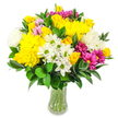 A lush, colour-rich bouquet of mixed flowers is displayed in a simple clear glass vase, photographed against a bright white background that heightens its cheerful impact. The arrangement is densely rounded, with generous clusters of large yellow roses and full, spherical yellow chrysanthemums forming a radiant, sunlit core. Their petals are tightly layered and slightly ruffled, creating an almost velvety texture that contrasts beautifully with the finer, more delicate white daisy-like flowers scattered throughout. These small daisies, each with a neat lime-green centre, give the bouquet a fresh, country-garden note, recalling the kind of wildflowers you might encounter strolling the edges of Epping Forest or passing through the green spaces around Bell Common. White chrysanthemums with soft, cushiony heads add even more fullness, while striking magenta and fuchsia chrysanthemums bring lively splashes of colour that instantly catch the eye. Nestled among them, subtle pastel pink blooms lend gentle depth and a whisper of romance. The entire composition is framed and supported by deep green foliage, its glossy, oval leaves curving around the flowers to create a harmonious, well-balanced silhouette. Through the clear glass of the vase, the freshly cut stems can be seen gathered neatly in the water, reinforcing the sense of just-arrived-from-the-florist freshness. The mood is bright, optimistic, and welcoming, ideal for sending a burst of happiness to a home near Epping High Street or as a centrepiece for a relaxed family celebration. It suggests gratitude, encouragement, and everyday joy, captured in an artfully composed, locally inspired floral design.