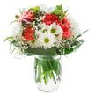 This bouquet, bursting with life and colour, seems to have captured the fresh spirit of Epping in bloom. Fluffy coral carnations, exuberant and ruffled, form the lively heart, their energy contrasted by crisp, pristine white chrysanthemums and a playful scattering of daisies with green-gold eyes. Wisps of cloud-like baby's breath drift between, softening every edge and casting a dreamy lightness that recalls early morning fog hovering in the Epping countryside. Delicate closed alstroemeria buds, tinged in magenta, peek out with promise, foreshadowing new growth and the evolving beauty of the arrangement. A collar of lush, deep green leaves anchors the composition, reaching protectively around the stems and echoing the foliage of Epping's many local gardens and parks. The transparent glass vase, filled with fresh water, makes the vivid stems visible, underscoring the arrangement's authenticity and freshness. Subtle, even lighting ensures the bouquet's detailed textures and cheerful palette shine without distraction. Whether gracing a family kitchen, welcoming guests to a friend's home in Theydon Bois, or served as a heartfelt birthday gift, this bouquet from Flowers Epping brings simple joy and elegance to everyday moments-reminding the recipient of Epping's natural beauty and uplifting community spirit.