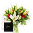 A striking bouquet unfolds with elegant simplicity, pairing the refined purity of white lilies with the passionate red of classic roses. Some lilies open while others rest in poised buds, releasing a gentle, sweet scent-a whisper of fresh spring mornings. The roses, velvety and deep, nestle among lush, vivid green foliage, their fiery presence radiating admiration and strength. Hints of eucalyptus and wispy grasses add movement and a subtle, herbal freshness. Light cascades softly over the petals, highlighting the crisp contrast between colours and the decadent texture of each bloom. Designed with gratitude and reverence, this arrangement feels like an ode to someone cherished and extraordinary-a vibrant tribute, whether for a milestone, a heartfelt thank you, or simply to celebrate a personal hero. In Epping, this bouquet is crafted by Flowers Epping for delivery across the town and surrounding communities, bringing a sense of calm and elegance to any room with same-day service that supports busy days and thoughtful moments.
